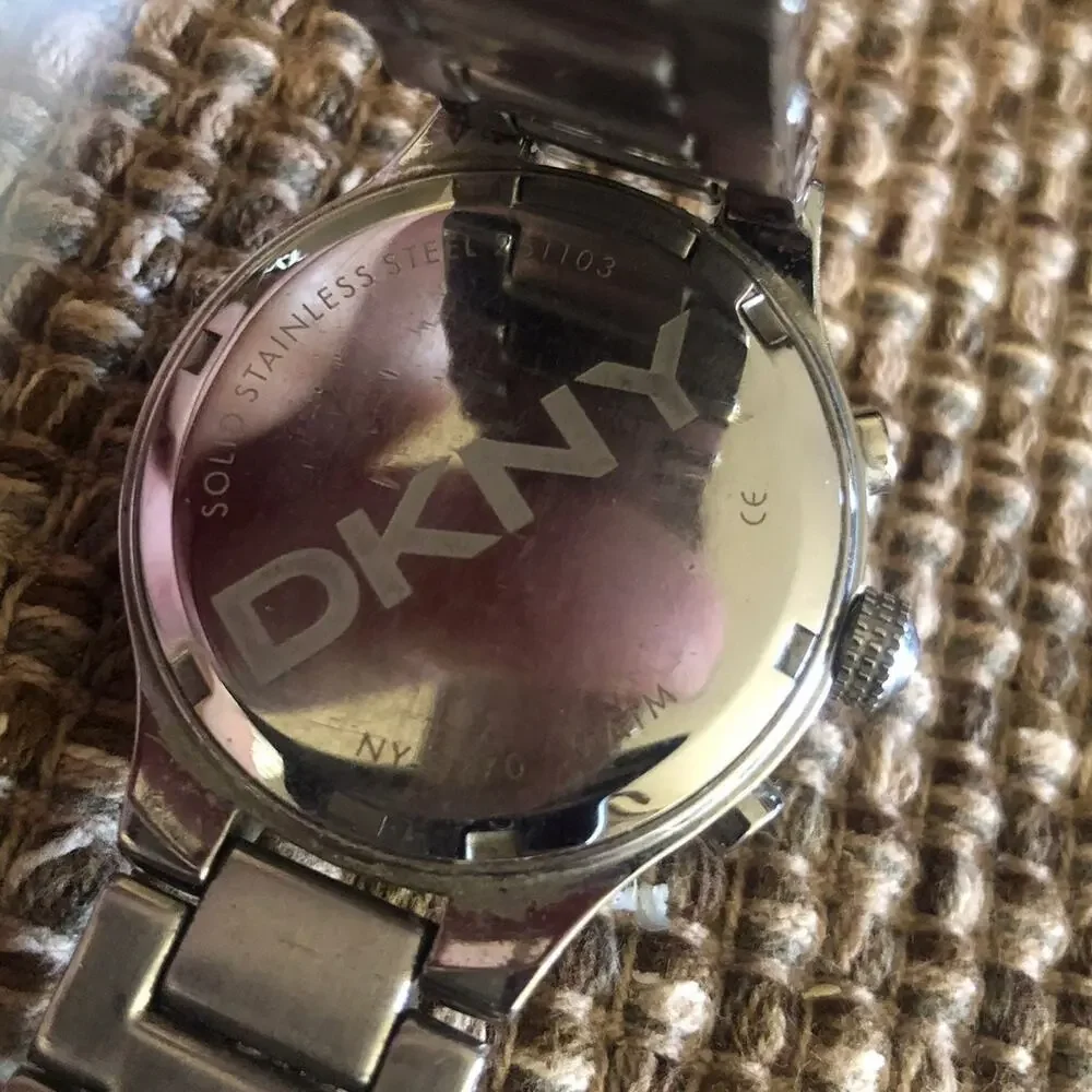 DKNY womens silver watch large dial rhinestone bezel